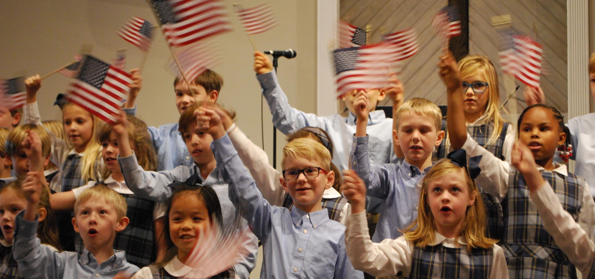 children waving flags